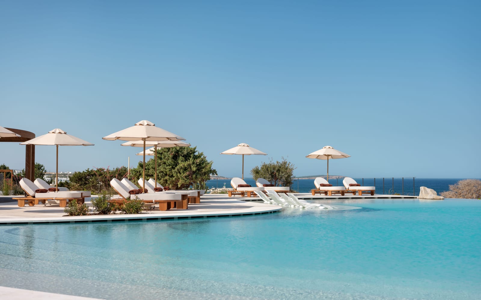 The main pool and sun terrace at Hotel Vione looking out over the Aegean